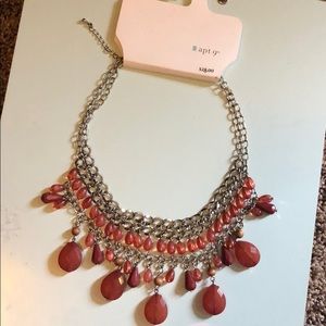 red and silver necklace